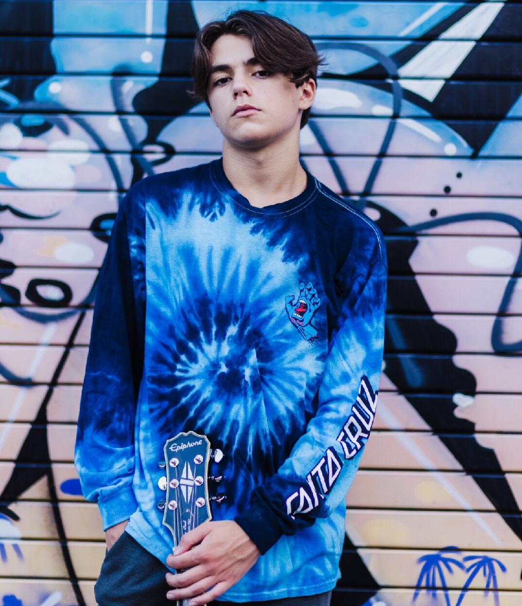 https://cdn.indiemusicreviews.net/images/heartfelt-and-poignant-lyricism-meets-soulful-acoustic-arrangement-up-and-coming-artist-kid-prexy-enthralls-all.jpg
