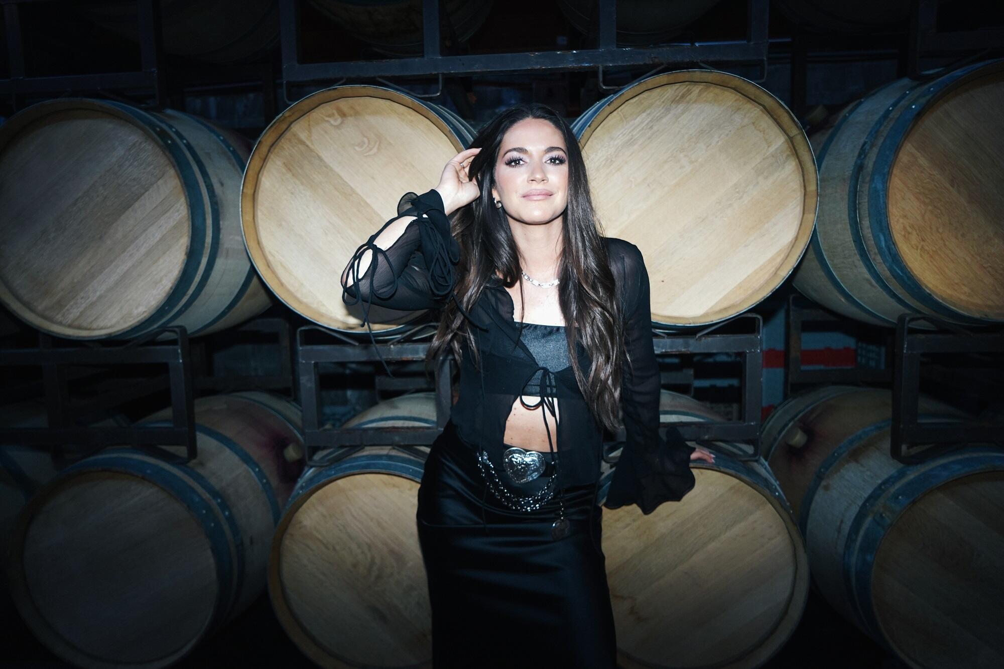 https://cdn.indiemusicreviews.net/images/rising-country-artist-hannah-ellis-pours-out-summer-fun-with-wine-country.jpg